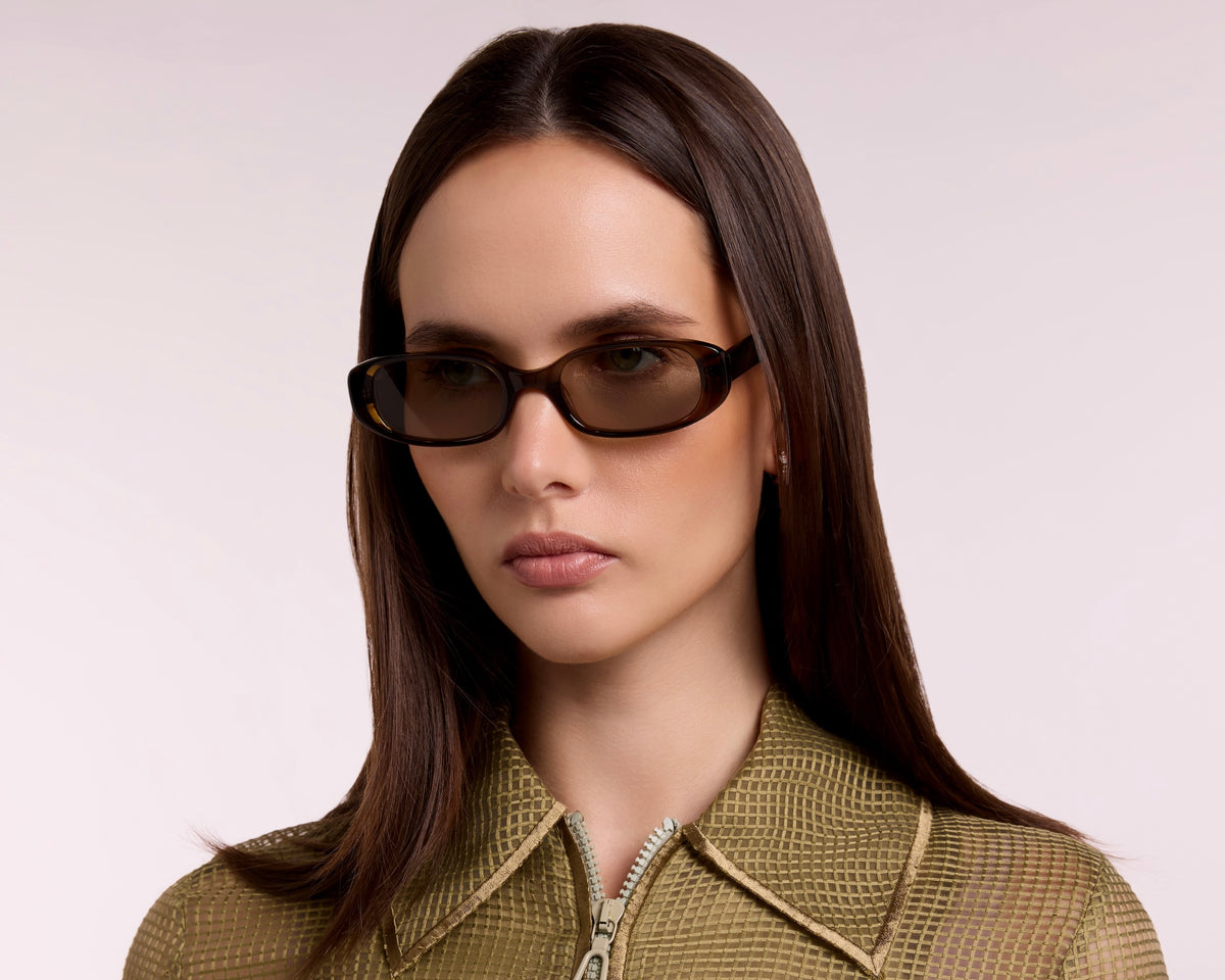 Nine Frames eyewear campaign featuring midnight blue and warm brown sunglasses